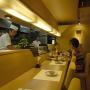 Customers and chefs at a traditional sushi bar Tokyo. Photo by JL, (c) ASC