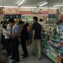 Reading magazines inside a convenience store Tokyo. Photo by JL, (c) ASC