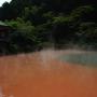 A hot springs bath with minerals tinting the water red in Beppu Kyushu. Photo by JL, (c) ASC
