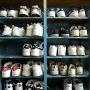 School shoe cubbies filled with gym shoes. Photo by JL, (c) ASC