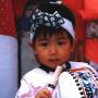 A young drummer in traditional garb prepares for a parade in Tokyo. Photo (c) KV, all rights reserved
