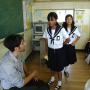 Junior high school students practice English with their ALT assistant language teacher. Photo by JL, (c) ASC