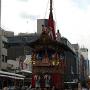 A danjiri large wooden cart in the shape of a shrine is pulled through the street at the Gion Festival in Kyoto. Photo by JL, (c) ASC