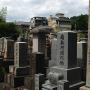 A Japanese graveyard with typical tall memorials. Photo by JL, (c) ASC